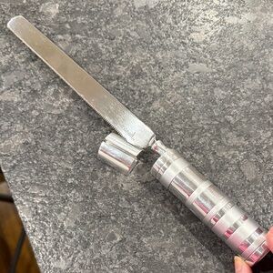 Emanuel bread knife with salt shaker in handle